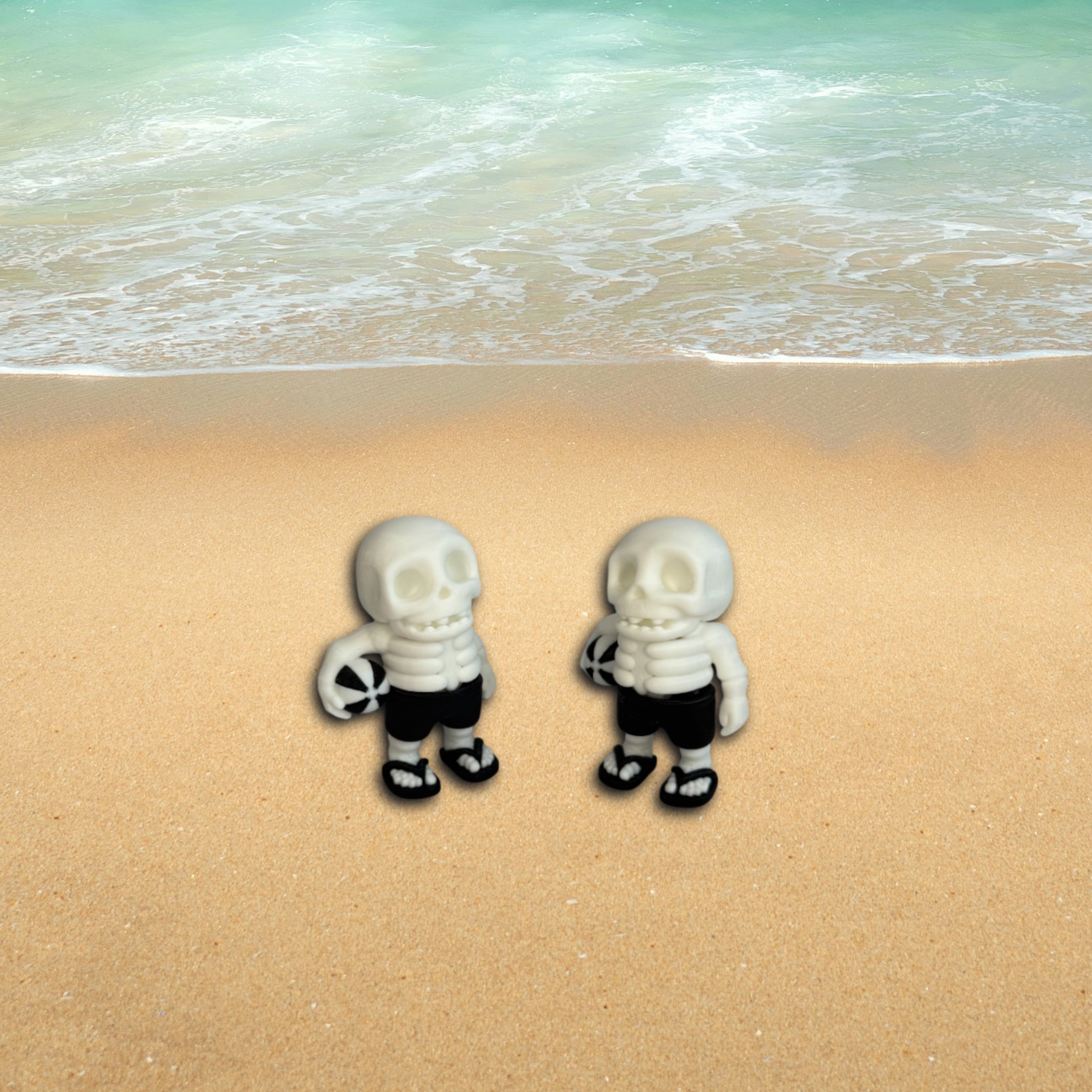 Two small skeleton figures on a sandy beach with ocean waves in the background.