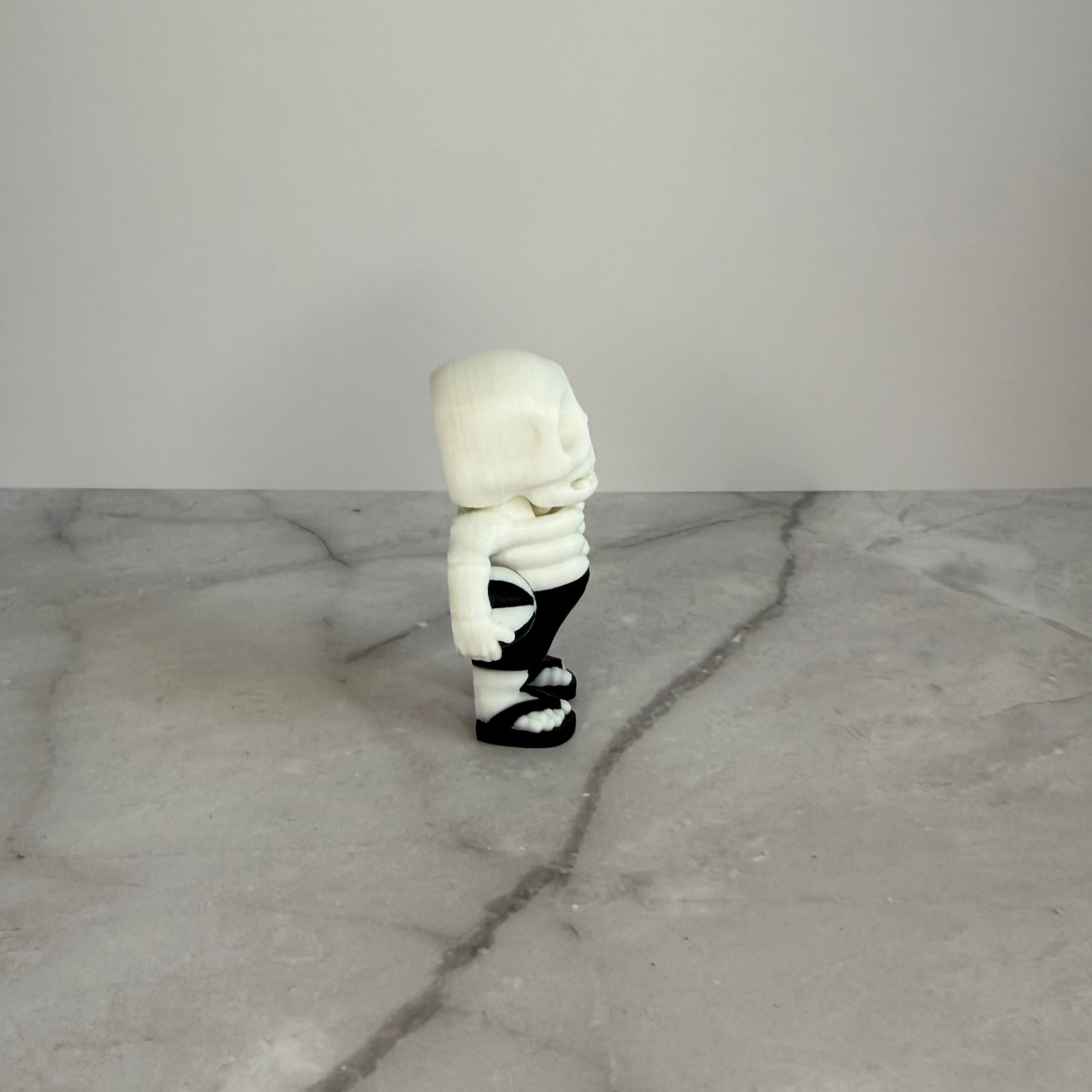 Skeletal figure with a beach ball on a gray background