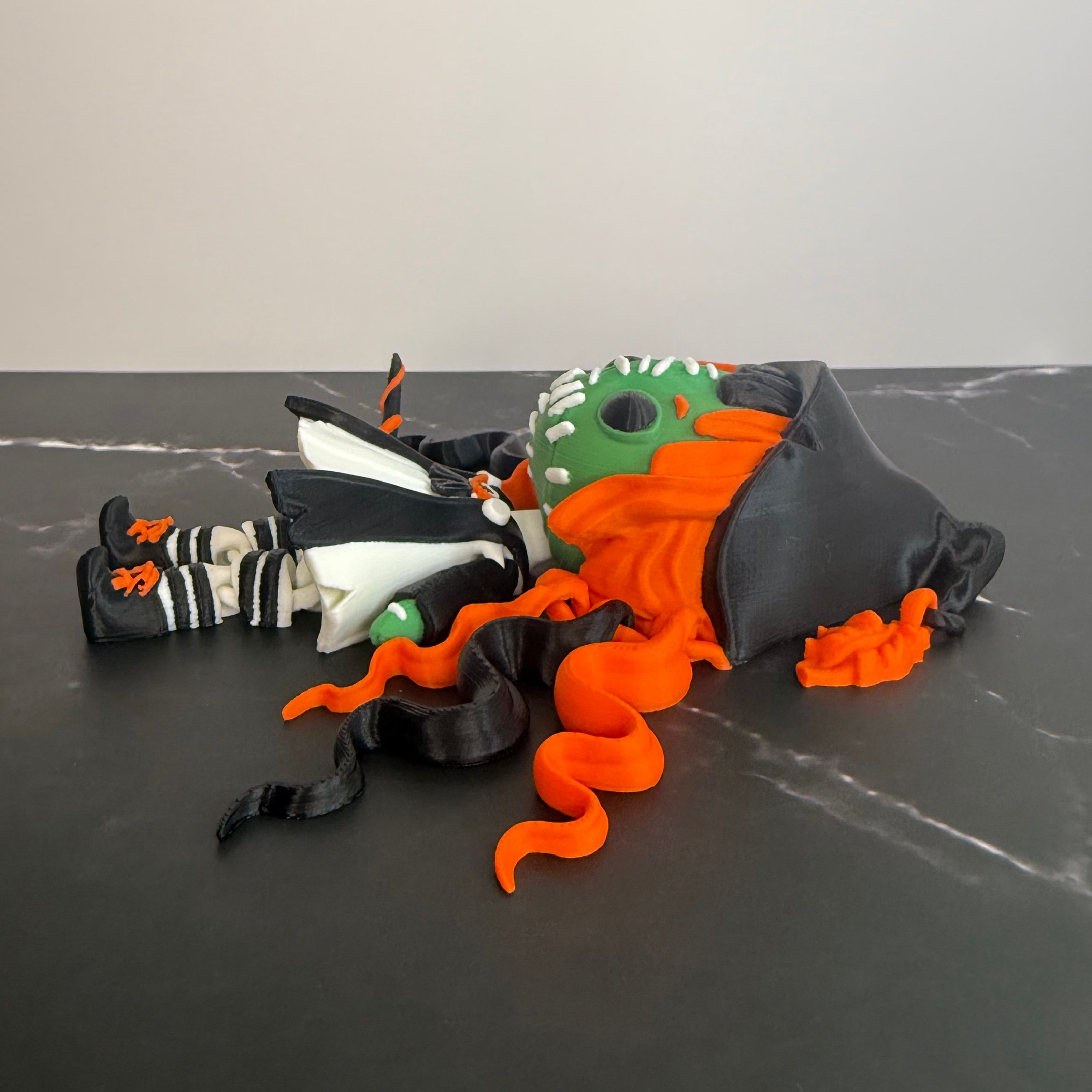 Toy figure with orange hair and green face on a dark textured background