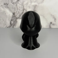 Back side of figure in black robe