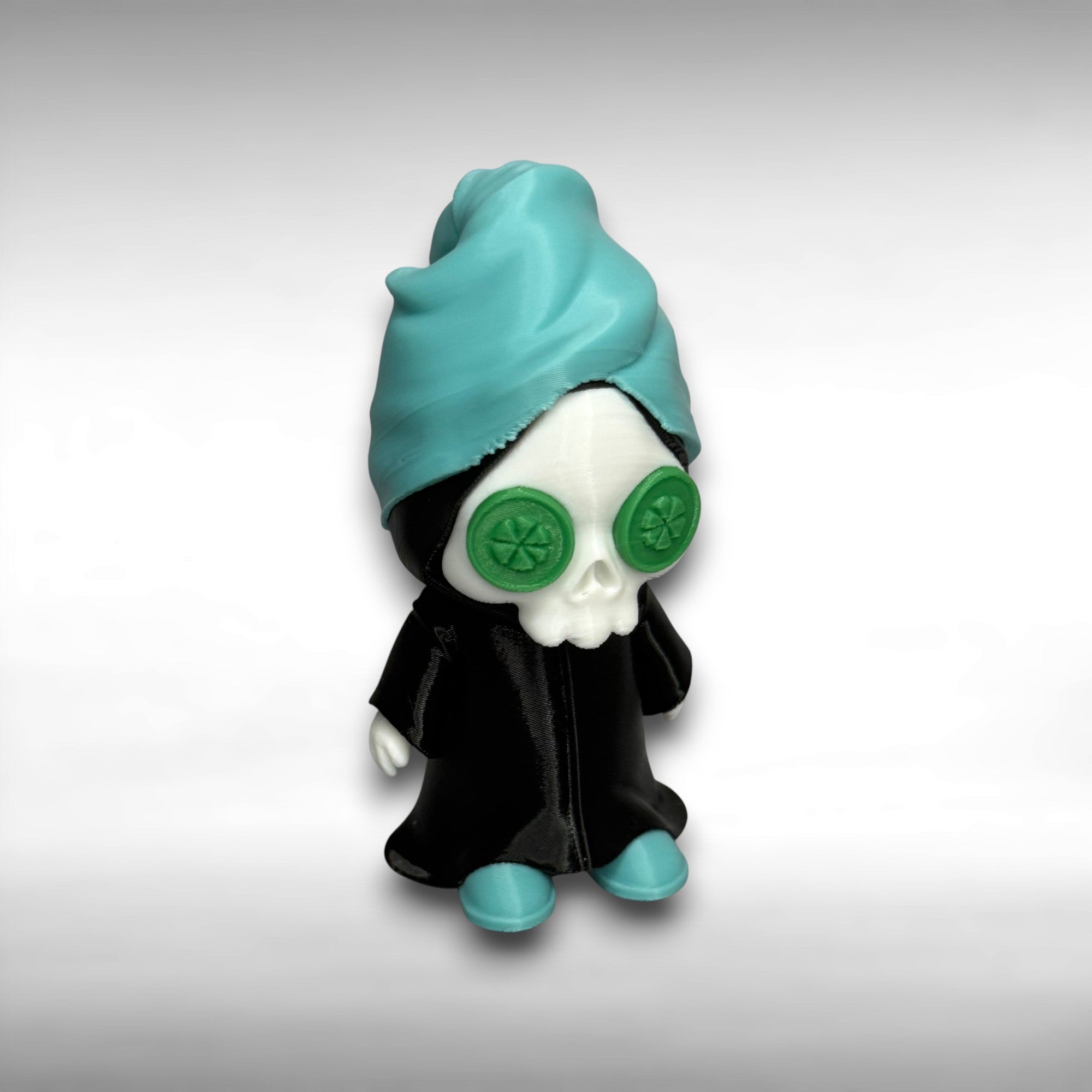 Grim reaper figure with teal head towel and shoes, black cloak, and green discs on eyes on a gray background