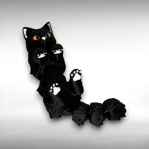 Black cat-shaped figure with orange eyes, white paw pads, and white ears on a gray background