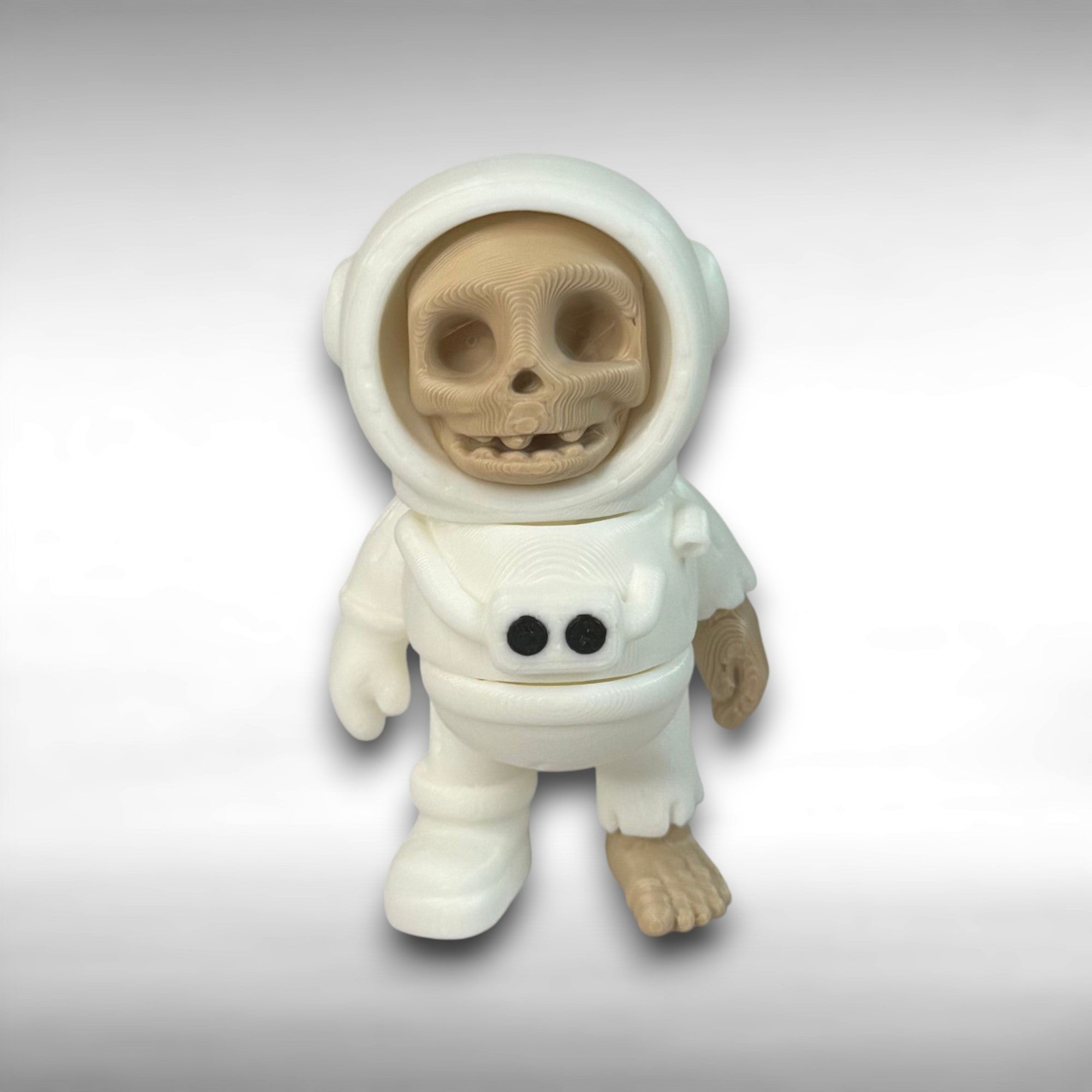 Skeleton in an astronaut suit on a gray background