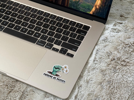 Pushing Up Daisies Zombie Hand Vinyl Sticker – Gothic Horror Decal, Creepy Graveyard Design, Spooky Zombie Art for Laptop or Water Bottle
